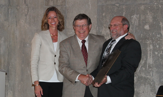 Ford B. West presented with dedication plaque from Jean Payne and Denis Doonan at The Ford B. West Center for Responsible Agriculture Launch The Ford B. West Center for Responsible Agriculture