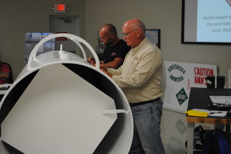 Man looking into a nurse tank